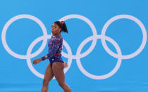 <p>TOKYO, JAPAN - JULY 25: Simone Biles of Team United States walks by the judges' table during Women's Qualification on day two of the Tokyo 2020 Olympic Games at Ariake Gymnastics Centre on July 25, 2021 in Tokyo, Japan. (Photo by Jamie Squire/Getty Images)</p> 