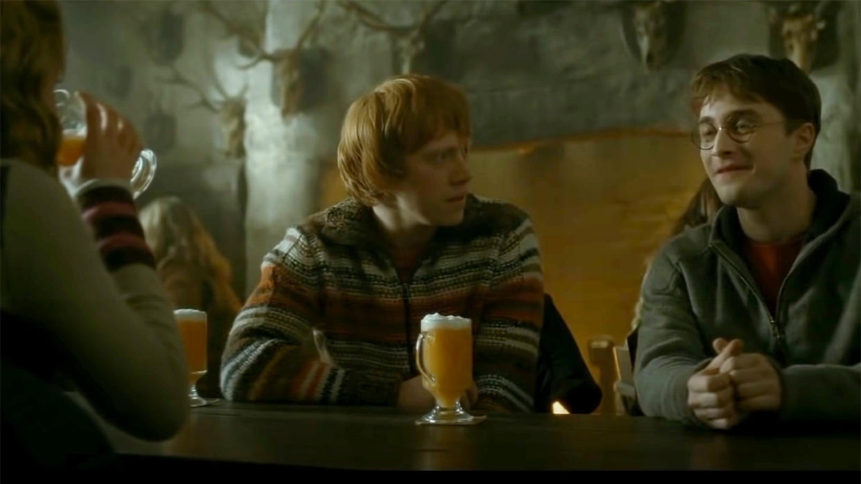  Harry, Ron and Hermione visit the Three Broomsticks for some Butterbeer. . 