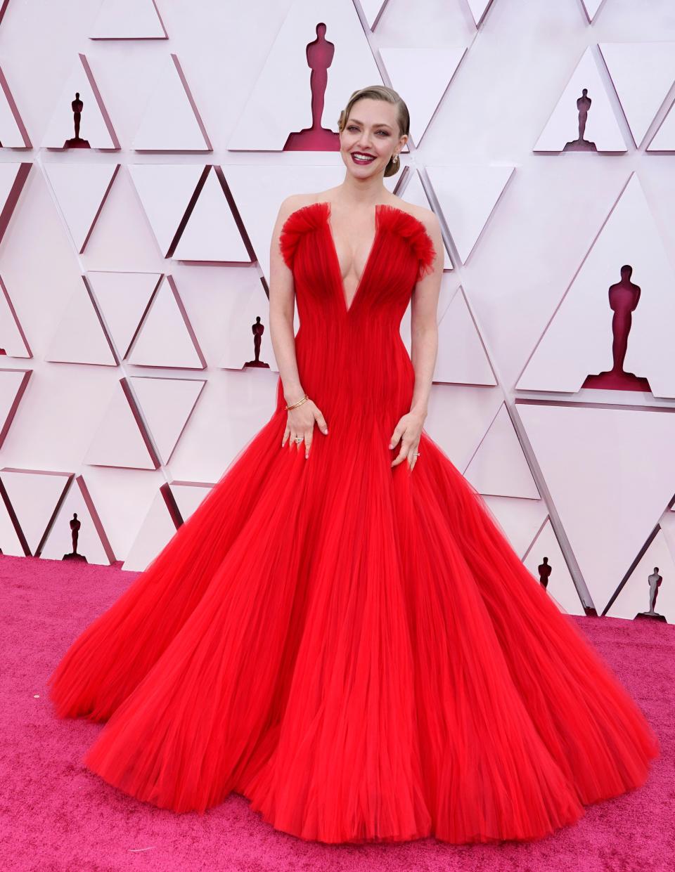 Amanda Seyfried on the 2021 Oscars pink carpet wearing ArmaniGetty