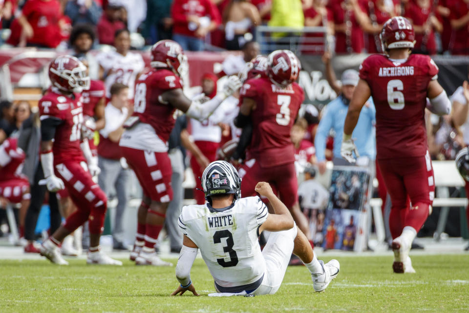 Memphis quarterback Brady White (3) looks on from the field after fumbling and losing the ball during the second half of an NCAA college football against Temple, Saturday, Oct. 12, 2019, in Philadelphia. Temple won 30-28. (AP Photo/Chris Szagola)