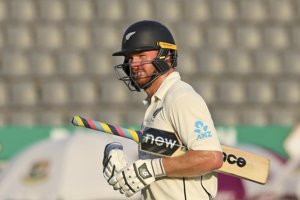 New Zealand's Glenn Phillips leaves the field after being dismissed during the fourth day of the first test cricket match at Sylhet, Bangladesh, Friday, Dec. 1, 2023. (AP Photo/Mosaraf Hossain)
