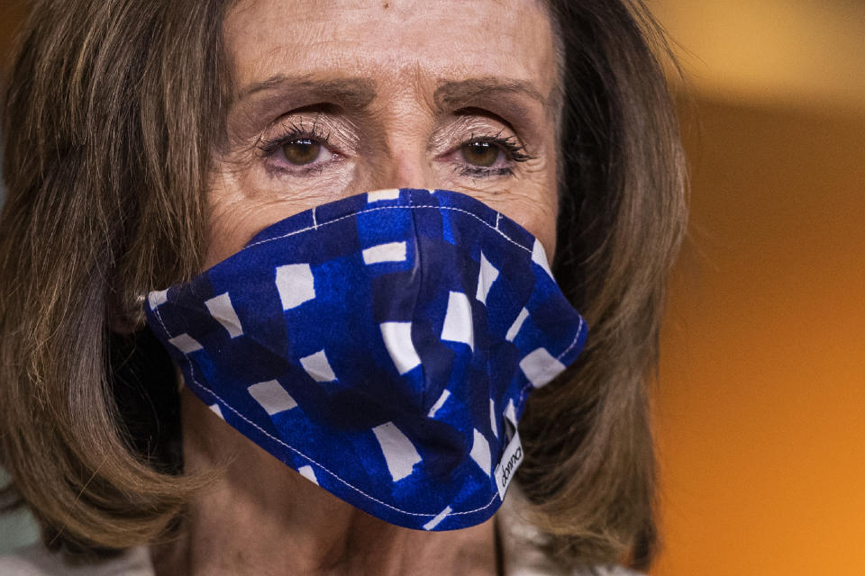 House Speaker Nancy Pelosi of Calif., listens to questions during a news conference on Capitol Hill, Thursday, April 30, 2020, in Washington. (AP Photo/Manuel Balce Ceneta)