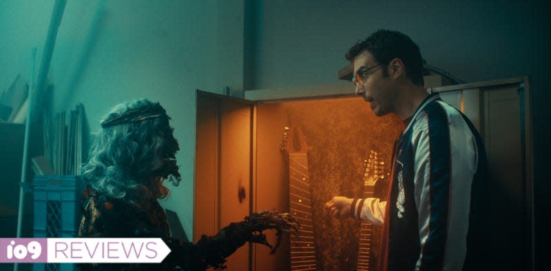 A reanimated skeleton and a living human man admire guitars in horror comedy Destroy All Neighbors