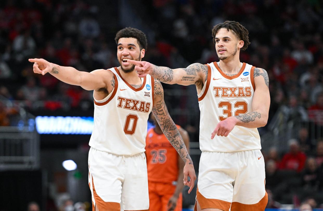 Texas forwards Timmy Allen, left, and Christian Bishop react to a play during the second half of the Longhorns' first-round victory over Virginia Tech in the NCAA Tournament at Fiserv Forum in Milwaukee. The Longhorns advance to Sunday's second round against Purdue.