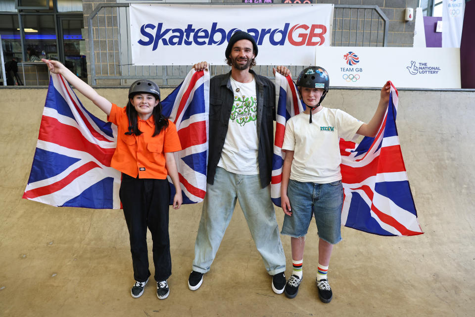 <p>HEMEL HEMPSTEAD, ENGLAND - AUGUST 04: Lola Tambling, Alex Halford and Miriam Nelson pose with the GB flag as Team GB Sky Brown's Olympic Bronze medal inspires the next generation of female skateboarders at the XC on August 4, 2021 in Hemel Hempstead, England. (Photo by Marc Atkins/Getty Images for National Lottery)</p>
