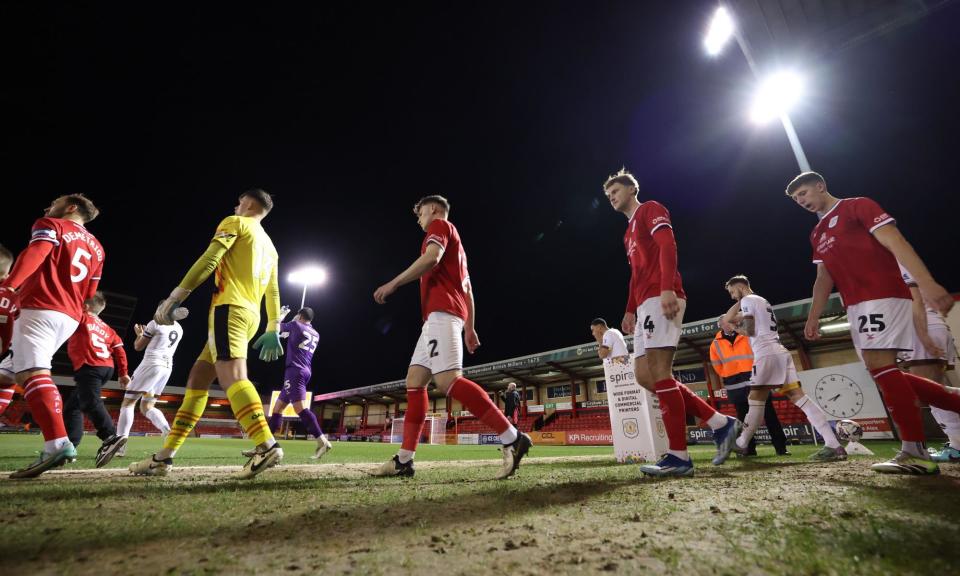 <span>Crewe, walking out for a home game against Sutton United, are pushing for promotion to League One.</span><span>Photograph: Ryan Browne/Shutterstock</span>