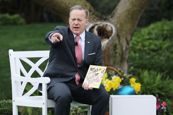 WASHINGTON, DC - APRIL 17:  White House Press Secretary Sean Spicer reads the childrens' book 'How To Catch The Easter Bunny' during the 139th Easter Egg Roll on the South Lawn of the White House April 17, 2017 in Washington, DC. The White House said 21,000 people are expected to attend the annual tradition of rolling colored eggs down the White House lawn that was started by President Rutherford B. Hayes in 1878.  (Photo by Chip Somodevilla/Getty Images)