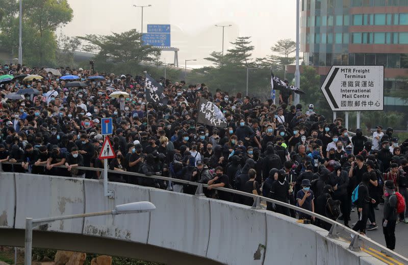 Anti-government protesters attend the "Lest We Forget" rally in Hong Kong