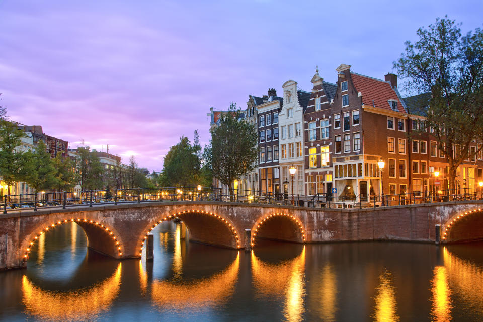 Keizersgracht Canal at dusk in Amsterdam, Netherlands. (Photo: Gettyimages)