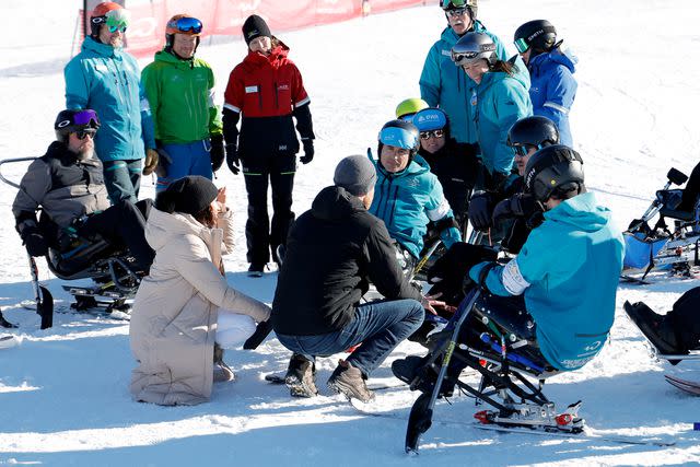 <p>Andrew Chin/Getty</p> Prince Harry and Meghan Markle attend the Invictus Games Winter Training Camp on Feb. 15, 2024.