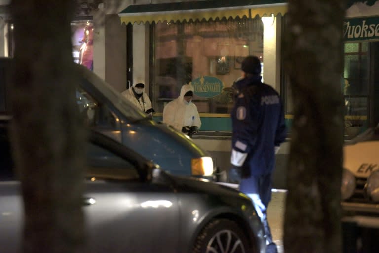 Finnish police investigators on the scene of a shooting incident at a restaurant in Imatra, on December 4, 2016