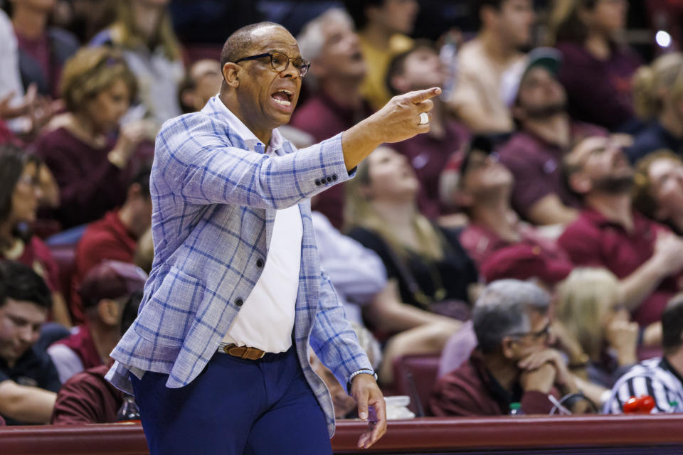 North Carolina head coach Hubert Davis directs his team during the second half of an NCAA college basketball game against Florida State, Saturday, Jan. 27, 2024, in Tallahassee, Fla. North Carolina defeated Florida State 75-68. (AP Photo/Colin Hackley)