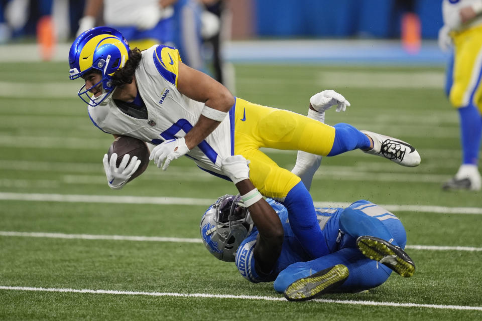 Los Angeles Rams wide receiver Puka Nacua (17) is tackled during the second half of an NFL wild-card playoff football game against the Detroit Lions, Sunday, Jan. 14, 2024, in Detroit. (AP Photo/Paul Sancya)