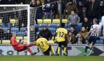 Britain Football Soccer - Millwall v Watford - FA Cup Fourth Round - The New Den - 29/1/17 Millwall's Steve Morison scores their first goal Reuters / Hannah McKay Livepic EDITORIAL USE ONLY. No use with unauthorized audio, video, data, fixture lists, club/league logos or "live" services. Online in-match use limited to 45 images, no video emulation. No use in betting, games or single club/league/player publications. Please contact your account representative for further details.