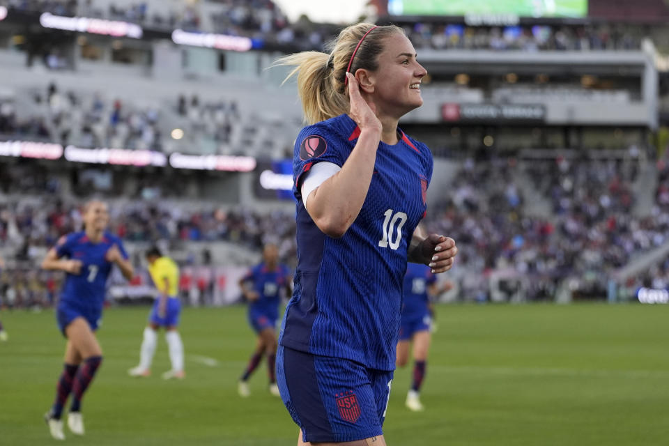 United States' Lindsey Horan (10) celebrates after scoring a goal during the first half of the CONCACAF Gold Cup women's soccer tournament final match against Brazil, Sunday, March 10, 2024, in San Diego. (AP Photo/Gregory Bull)