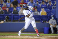 Toronto Blue Jays' Vladimir Guerrero Jr. hits a solo home run against the Philadelphia Phillies during the sixth inning of a baseball game Friday, May 14, 2021, in Dunedin, Fla. (AP Photo/Mike Carlson)