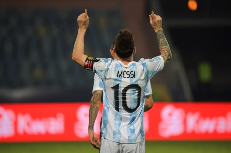 Lionel Messi celebrates after scoring the final goal in Argentina's 3-0 Copa America win over Ecuador
