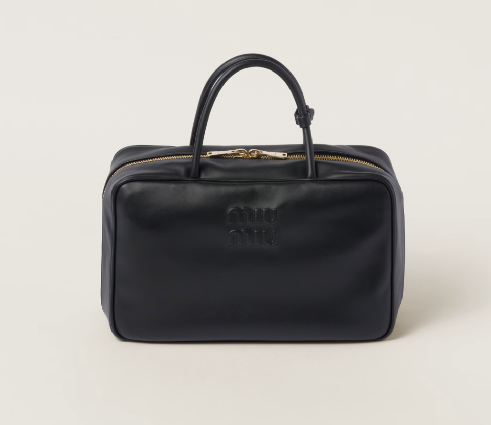 <p><a href="https://go.redirectingat.com?id=74968X1596630&url=https%3A%2F%2Fwww.miumiu.com%2Fus%2Fen%2Fp%2Fleather-top-handle-bag%2F5BB117_2DDJ_F0002_V_OOO%3Fs_kwcid%3DAL%25218549%25213%2521%2521%2521%2521x%2521%2521%26gad_source%3D1%26gclid%3DCjwKCAiA3aeqBhBzEiwAxFiOBnFt1J8u6k1WbQE3ugZaVUgN20BEnSbECJMpZwnSIfxnI5s9UcHhXBoCuw8QAvD_BwE%26gclsrc%3Daw.ds&sref=https%3A%2F%2Fwww.cosmopolitan.com%2Fentertainment%2Fcelebs%2Fa45547054%2Fgigi-hadid-bradley-cooper-relationship-timeline%2F" rel="nofollow noopener" target="_blank" data-ylk="slk:Shop Now;elm:context_link;itc:0;sec:content-canvas" class="link ">Shop Now</a></p><p>Bowling Bag</p><p>miumiu.com</p><p>$2023.00</p>