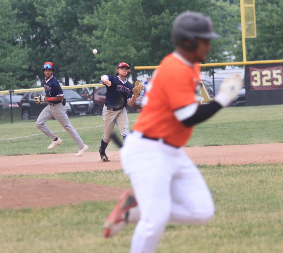 Watkins Memorial graduate Dominic Depa makes the throw from third base for the Licking County Settlers against the visiting Richmond Jazz during a 15-11 loss in the season opener at New Albany on Tuesday, June 6, 2023.