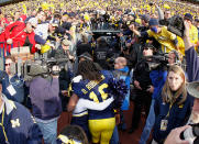 Denard Robinson #16 of the Michigan Wolverines leaves the field after beating Ohio State 40-34 at Michigan Stadium on November 26, 2011 in Ann Arbor, Michigan. (Photo by Gregory Shamus/Getty Images)