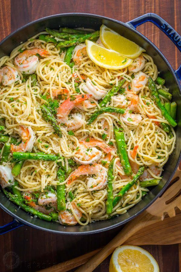 shrimp scampi pasta with asparagus in a skillet