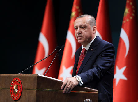 Turkish President Tayyip Erdogan addresses a news conference at the Presidential Palace in Ankara, Turkey, April 18, 2018. Murat Cetinmuhurdar/Presidential Palace/Handout via REUTERS