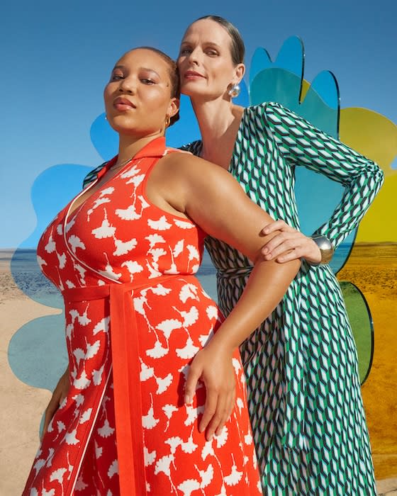 Two women posing together wearing Diane von Furstenberg for Target wrap dresses.