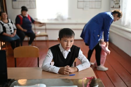 The Wider Image: Russian village's last teacher stays on for her one remaining pupil