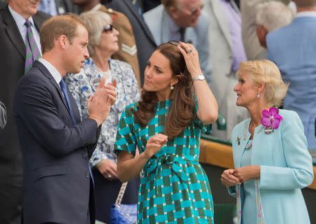 Jul 6, 2014; London, United Kingdom; Prince William the Duke of Cambridge and Kate Middleton the Duchess of Cambridge in attendance for the match between Novak Djokovic (SRB) and Roger Federer (SUI) on day 13 of the 2014 Wimbledon Championships at the All England Lawn and Tennis Club. Susan Mullane-USA TODAY Sports