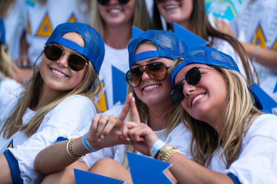 Members of Delta Delta Delta pose for a photo in front of their sorority house on Bid Day at The University of Alabama. Sunday August 14, 2022. [Photo/Will McLelland] 