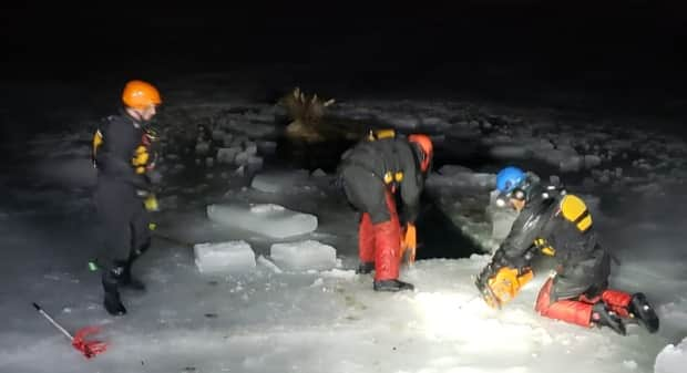 Fyten says this picture shows officers working through the night on March 27, after four elk fell through the ice in the same spot. He says one had to be euthanized after suffering for hours from injuries. 