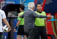 Soccer Football - World Cup - Group C - France vs Australia - Kazan Arena, Kazan, Russia - June 16, 2018 Referee Andres Cunha reviews a incident on VAR before awarding a penalty to France REUTERS/John Sibley