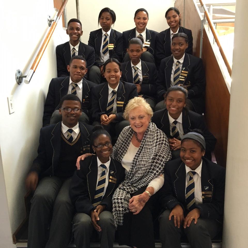 Christel DeHaan with students in South Africa.