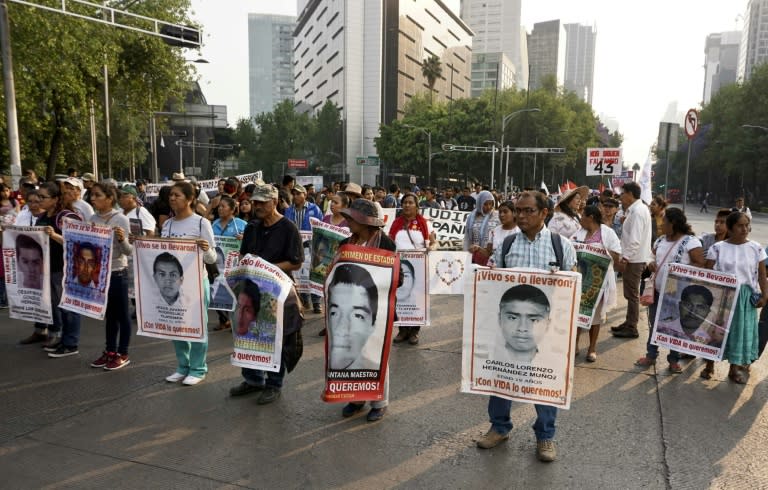 Relatives of 43 students who went missing in the town of Ayotzinapa in 2014