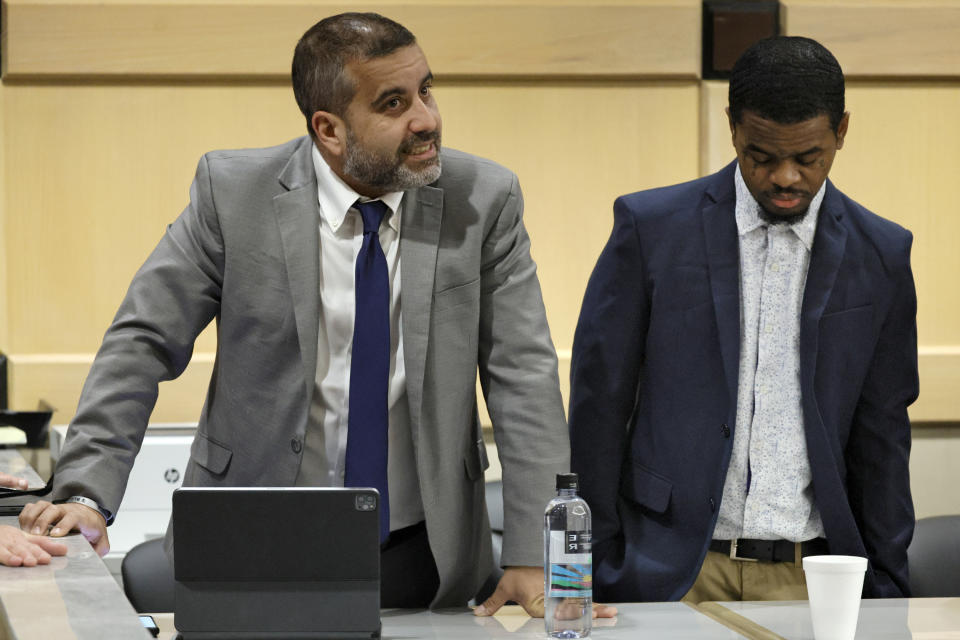 Attorney Mauricio Padilla stands with his client, suspected shooting accomplice Dedrick Williams, right, as he speaks in court about an allegation that at least one juror saw Williams brought into court via the front entrance in shackles, before the start of day two of closing arguments in the XXXTentacion murder trial at the Broward County Courthouse in Fort Lauderdale, Fla., Wednesday, March 8, 2023. Emerging rapper XXXTentacion, born Jahseh Onfroy, 20, was killed during a robbery outside of Riva Motorsports in Pompano Beach in 2018, allegedly by defendants Michael Boatwright, Trayvon Newsome, and Williams. (Amy Beth Bennett/South Florida Sun-Sentinel via AP, Pool)