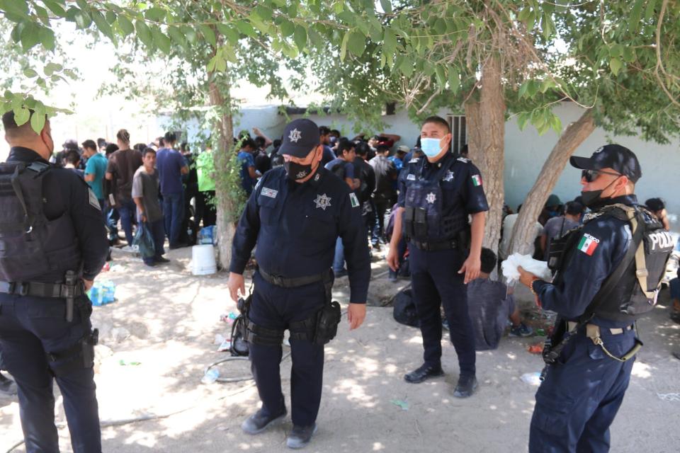 Juárez police found about 140 migrants crowded into a stash house in early June 2021.