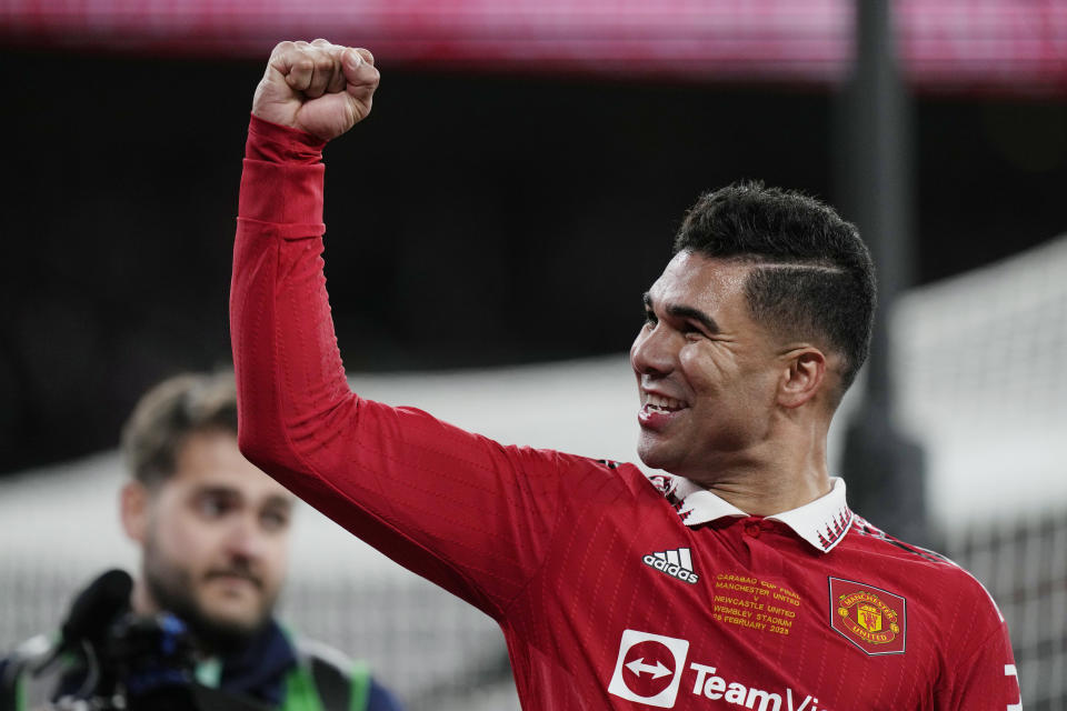 Manchester United's Casemiro celebrates after the English League Cup final soccer match between Manchester United and Newcastle United at Wembley Stadium in London, Sunday, Feb. 26, 2023. (AP Photo/Alastair Grant)