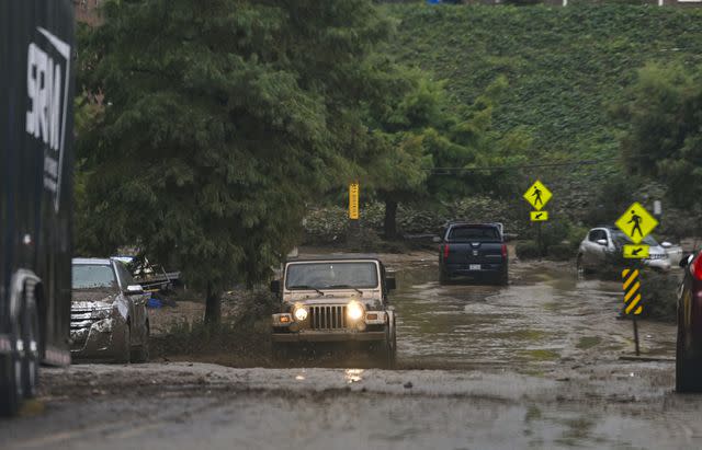 <p>Peter Zay/Anadolu via Getty</p> A photo of the scene in Asheville on Sept. 30, 2024