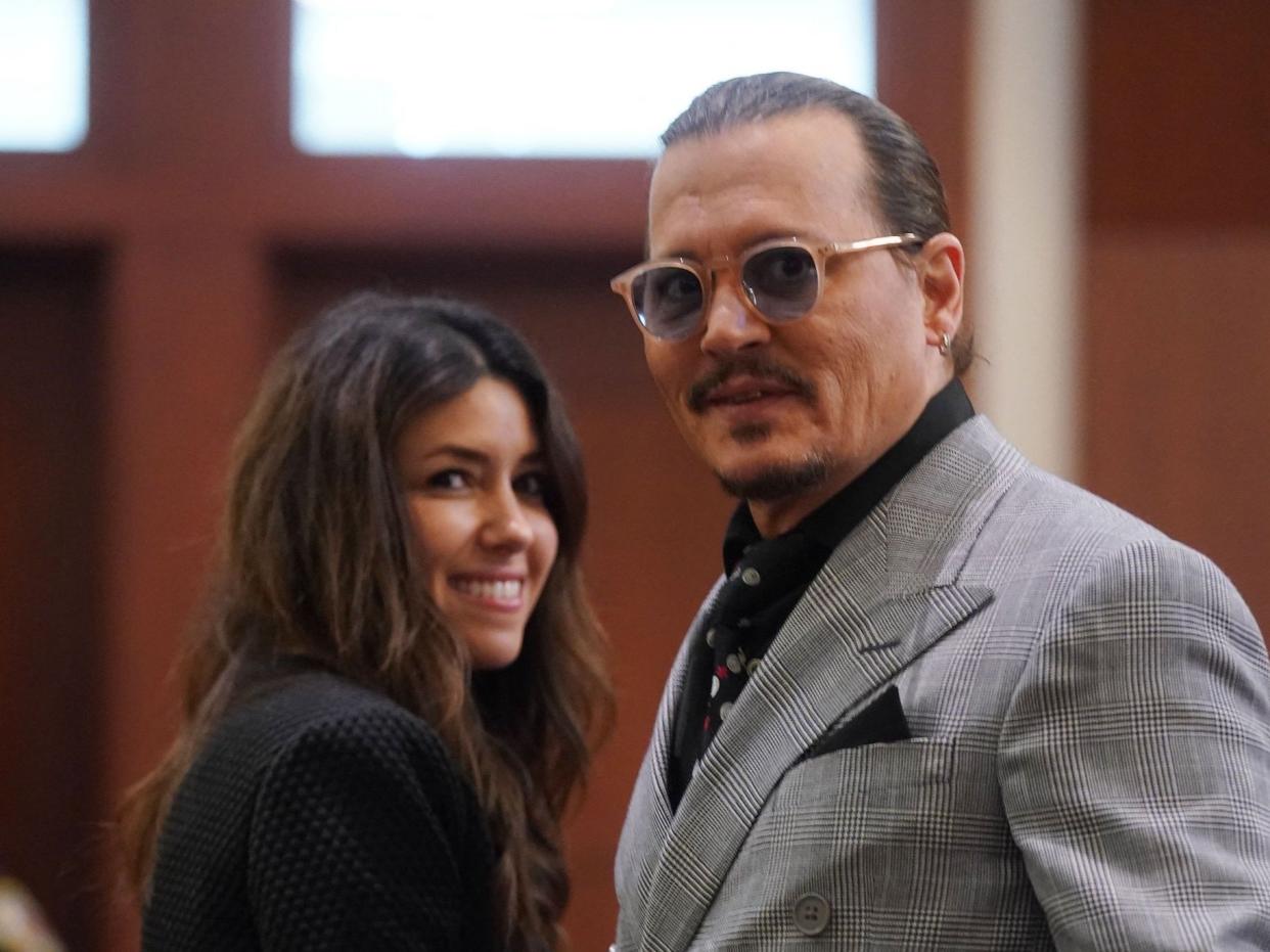 Johnny Depp and his attorney Camille Vasquez at the Amber Heard defamation trial in 2022 (POOL/AFP via Getty Images)