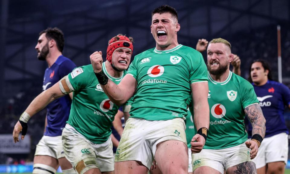 <span>Dan Sheehan celebrates scoring <a class="link " href="https://sports.yahoo.com/soccer/teams/republic-of-ireland-women/" data-i13n="sec:content-canvas;subsec:anchor_text;elm:context_link" data-ylk="slk:Ireland;sec:content-canvas;subsec:anchor_text;elm:context_link;itc:0">Ireland</a>’s fourth try against <a class="link " href="https://sports.yahoo.com/soccer/teams/france-women/" data-i13n="sec:content-canvas;subsec:anchor_text;elm:context_link" data-ylk="slk:France;sec:content-canvas;subsec:anchor_text;elm:context_link;itc:0">France</a> with Josh van der Flier and Andrew Porter.</span><span>Photograph: Dan Sheridan/Inpho/Shutterstock</span>