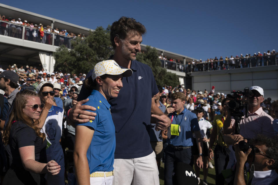 Spanish former basketball player Pau Gasol (R) poses with Team Europe’s Spanish golfer Carlota Ciganda on the last day of the 2023 Solheim Cup biennial team golf competition at Finca Cortesin golf club in Casares, on Sepetember 24, 2023.