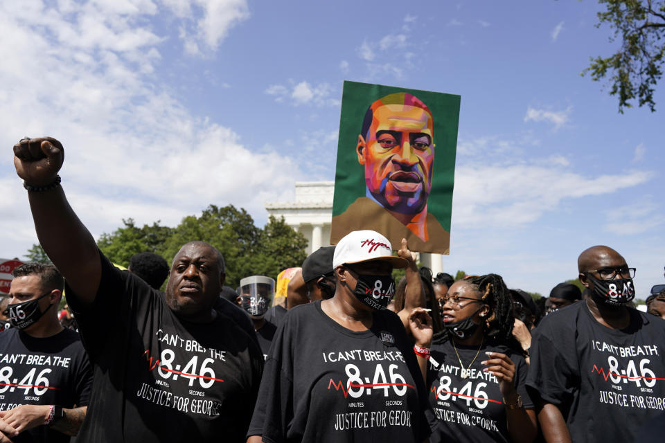 Members of the George Floyd family march from the Lincoln Memorial to the Martin Luther King Jr. Memorial during the March on Washington, Friday Aug. 28, 2020, in Washington. (AP Photo/Carolyn Kaster)