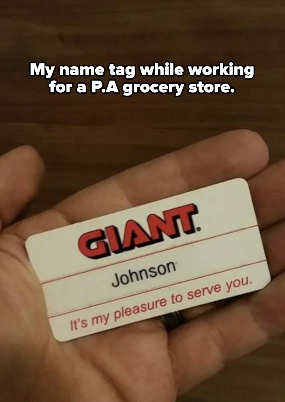 A hand holds a name tag from GIANT with the name "Johnson" displayed. The tag also reads, "It's my pleasure to serve you."