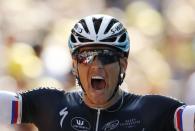 Etixx-Quick Step rider Zdenek Stybar of the Czech Republic celebrates as he crosses the finish line to win the 191.5-km (118.9 miles) 6th stage of the 102nd Tour de France cycling race from Abbeville to Le Havre, France, July 9, 2015. REUTERS/Stefano Rellandini