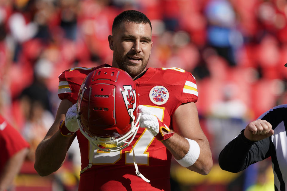 Kansas City Chiefs tight end Travis Kelce warms up before the start of an NFL football game between the Kansas City Chiefs and the Los Angeles Chargers Sunday, Oct. 22, 2023, in Kansas City, Mo. (AP Photo/Ed Zurga)