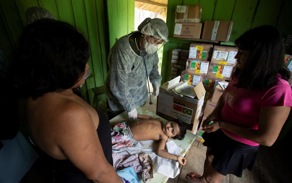 Doctors have been delivering tests to the Yanomami community in Auaris - EPA