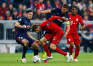 Britain Football Soccer - Bayern Munich v Atletico Madrid - UEFA Champions League Semi Final Second Leg - Allianz Arena, Munich - 3/5/16 Atletico Madrid's Saul Niguez and Gabi in action with Bayern Munich's Thomas Muller Reuters / Ralph Orlowski Livepic