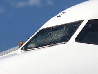 Shattered windshield on the BA plane that made an emergency landing in Athens on Saturday.