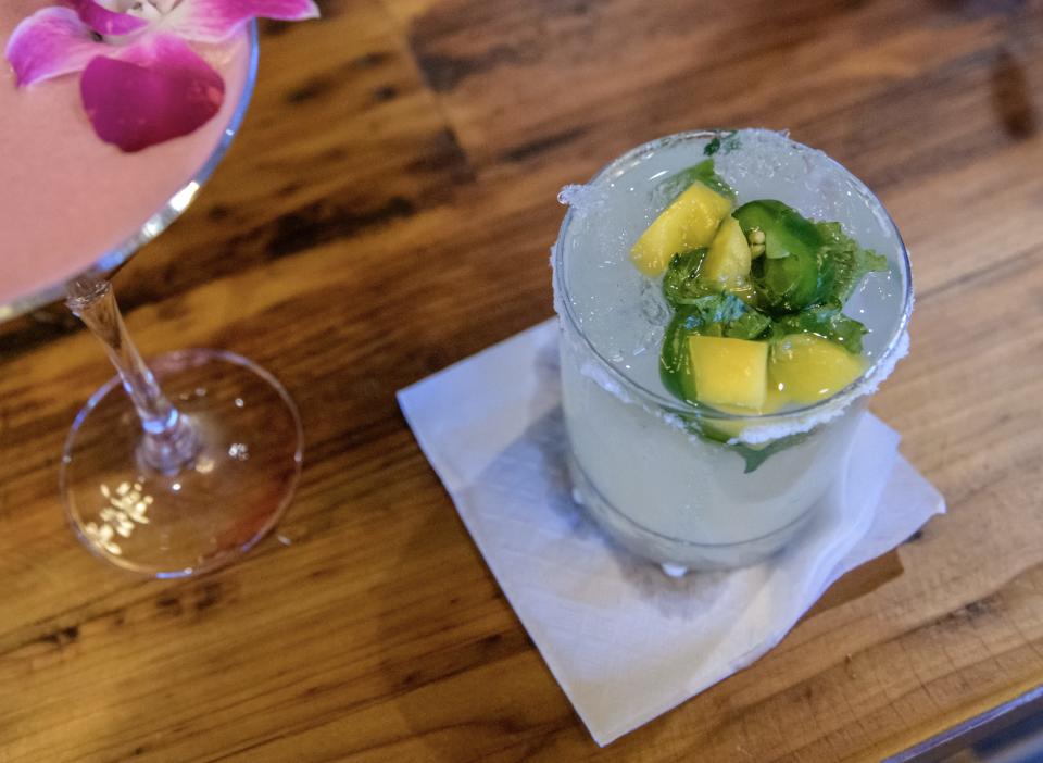 A freshly-made El Chapo cocktail sits on a table at the new Latin-themed restaurant Verandah Cocina Latina in Morton.