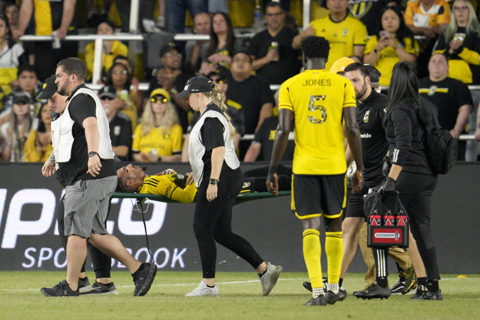 Columbus Crew's Mohamed Farsi is stretchered off the pitch during the second half of an MLS soccer match against CF Montréal, Saturday, April 27, 2024, in Columbus, Ohio. (AP Photo/Jeff Dean)